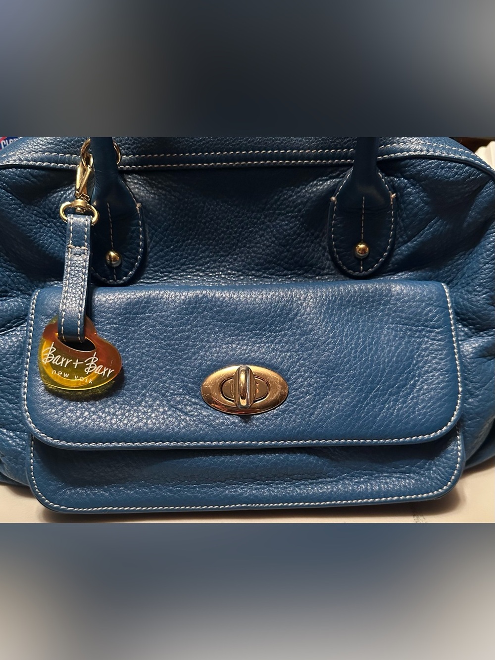 Barr + Barr blue pebble leather hand bag.